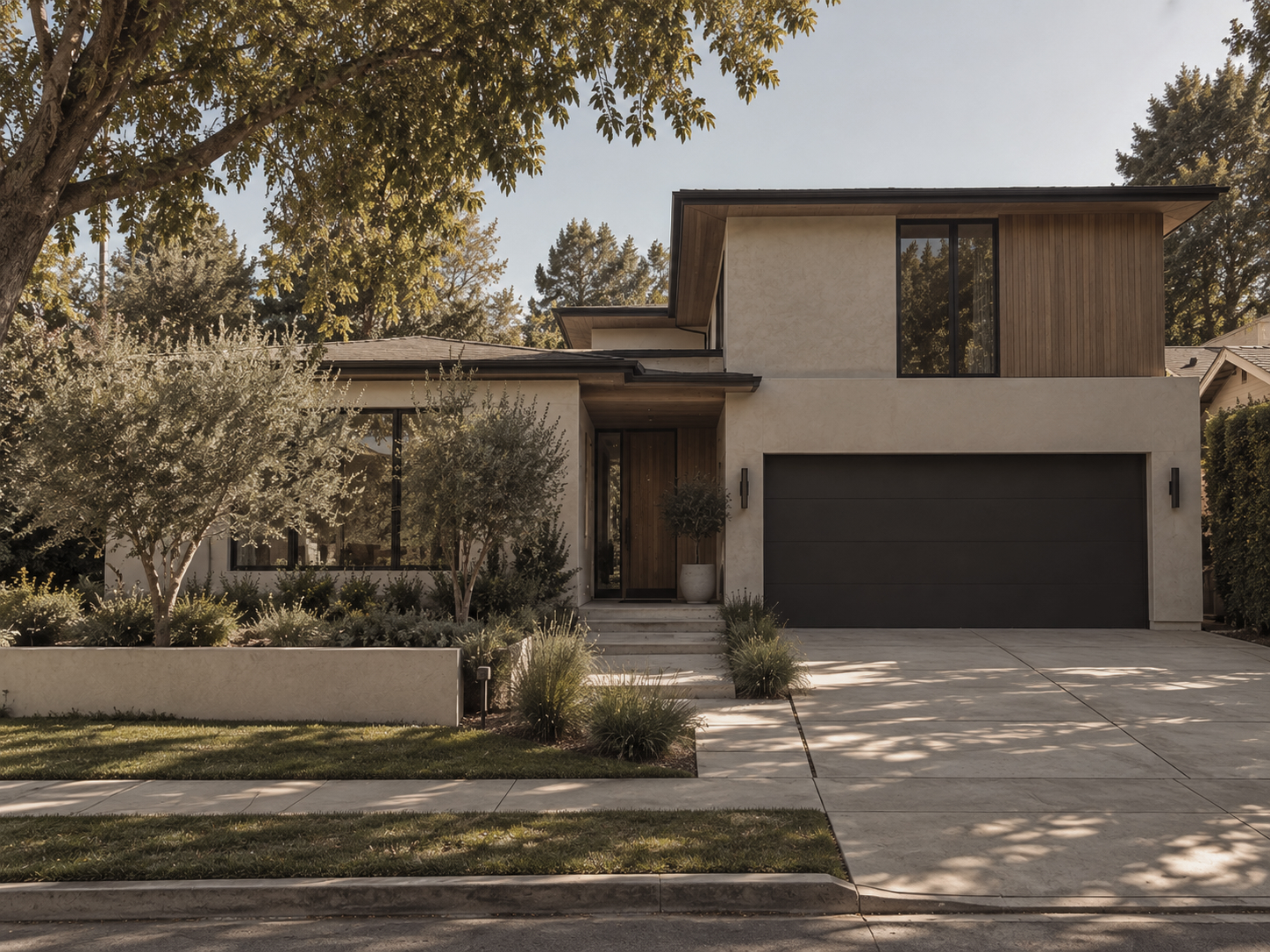 Contemporary Brentwood residence framed by mature trees and layered landscaping